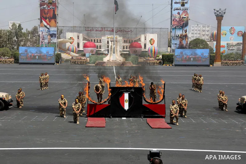 Egyptian forces demonstrate their skills during a military academy graduation ceremony in the capital, Cairo, on July 21, 2016. Photo by Egyptian President Office