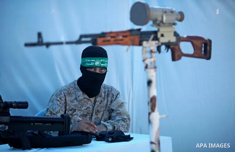 A picture taken on July 21, 2016 shows weapons during a weapon exhibition at a Hamas-run youth summer camp, in Gaza City. Photo by Ashraf Amra