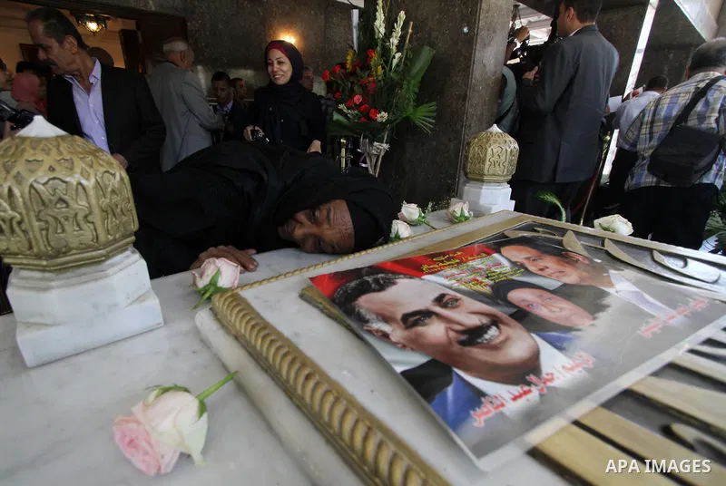 Egyptians visit the grave of former Egyptian President Gamal Abdel Nasser, on the occasion of the 64th anniversary of July 23 revolution, in Cairo, on July 23, 2016. Photo by Amr Sayed