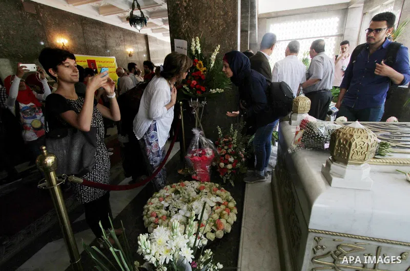 Egyptians visit the grave of former Egyptian President Gamal Abdel Nasser, on the occasion of the 64th anniversary of July 23 revolution, in Cairo, on July 23, 2016. Photo by Amr Sayed