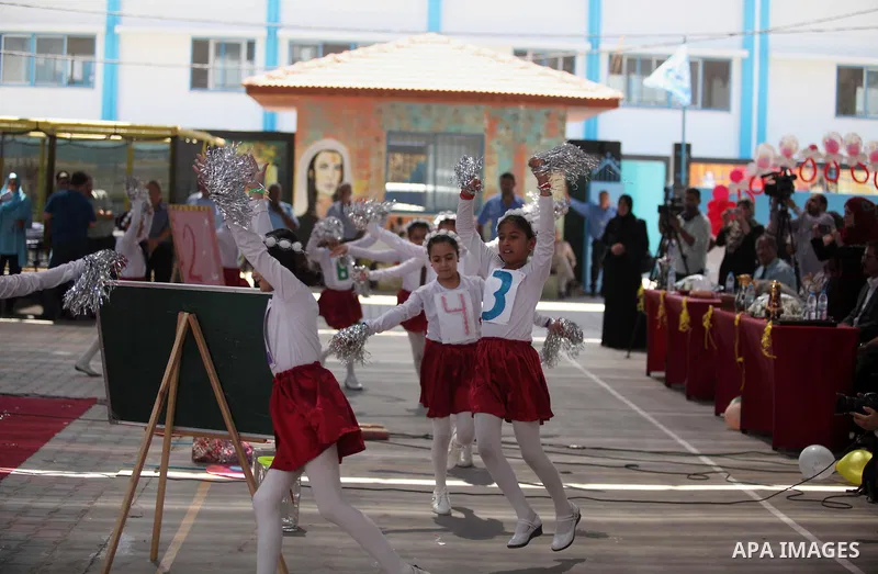 Palestinian youth enjoy as part of the activities proposed during a summer camp organised by the United Nations on July 23, 2016 in Gaza City. Photo by Ashraf Amra
