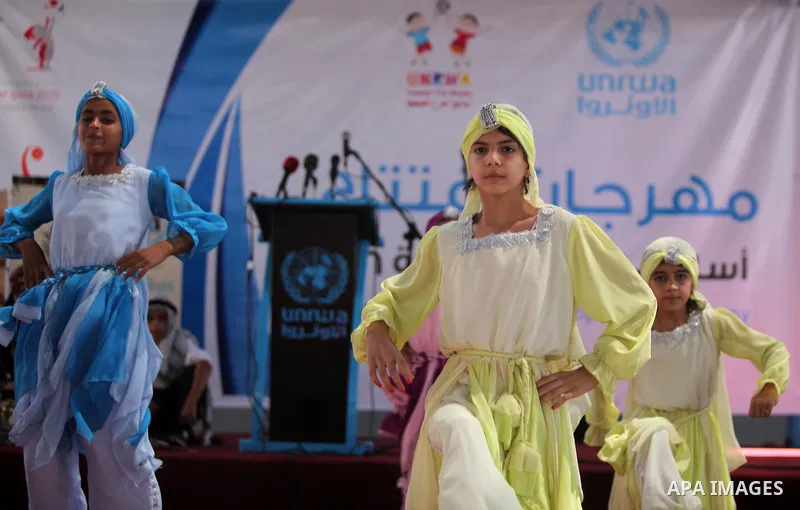 Palestinian youth enjoy as part of the activities proposed during a summer camp organised by the United Nations on July 23, 2016 in Gaza City. Photo by Ashraf Amra