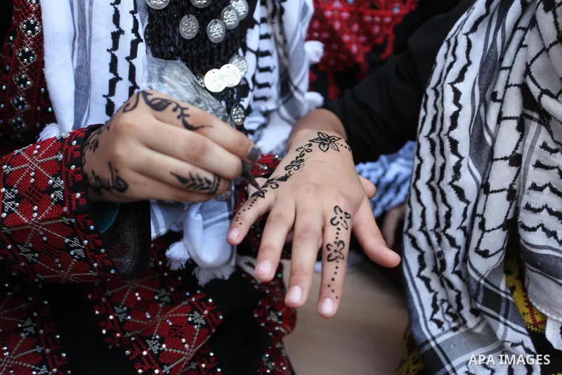 Palestinian youth enjoy as part of the activities proposed during a summer camp organised by the United Nations on July 23, 2016 in Gaza City. Photo by Ashraf Amra