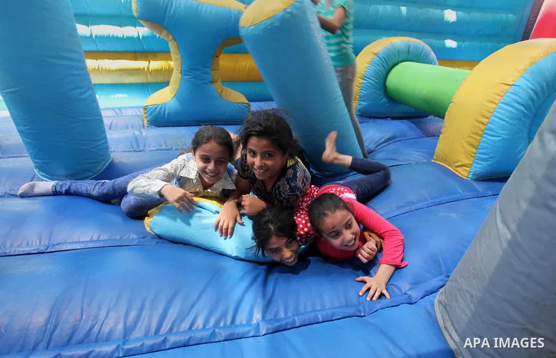 Palestinian youth enjoy as part of the activities proposed during a summer camp organised by the United Nations on July 23, 2016 in Gaza City. Photo by Ashraf Amra