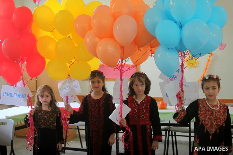 Palestinian youth enjoy as part of the activities proposed during a summer camp organised by the United Nations on July 23, 2016 in Gaza City. Photo by Ashraf Amra