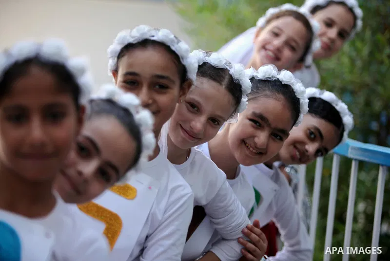 Palestinian youth enjoy as part of the activities proposed during a summer camp organised by the United Nations on July 23, 2016 in Gaza City. Photo by Ashraf Amra