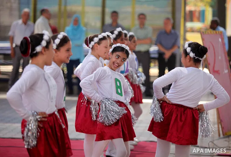 Palestinian youth enjoy as part of the activities proposed during a summer camp organised by the United Nations on July 23, 2016 in Gaza City. Photo by Ashraf Amra