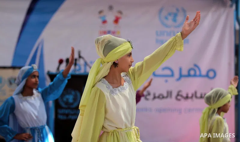 Palestinian youth enjoy as part of the activities proposed during a summer camp organised by the United Nations on July 23, 2016 in Gaza City. Photo by Ashraf Amra