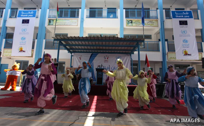 Palestinian youth enjoy as part of the activities proposed during a summer camp organised by the United Nations on July 23, 2016 in Gaza City. Photo by Ashraf Amra