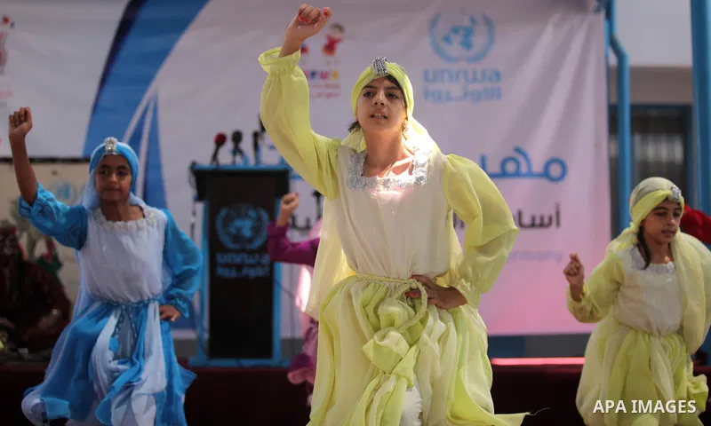 Palestinian youth enjoy as part of the activities proposed during a summer camp organised by the United Nations on July 23, 2016 in Gaza City. Photo by Ashraf Amra