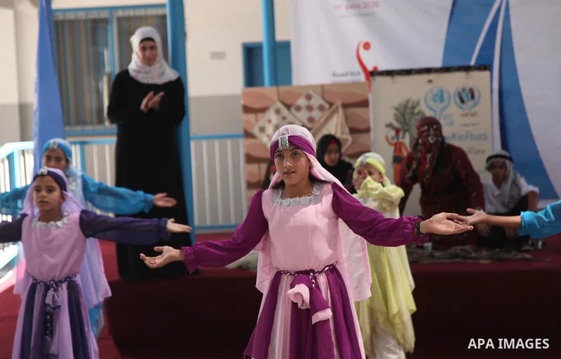 Palestinian youth enjoy as part of the activities proposed during a summer camp organised by the United Nations on July 23, 2016 in Gaza City. Photo by Ashraf Amra