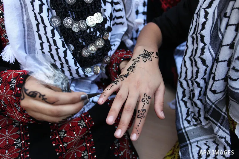 Palestinian youth enjoy as part of the activities proposed during a summer camp organised by the United Nations on July 23, 2016 in Gaza City. Photo by Ashraf Amra