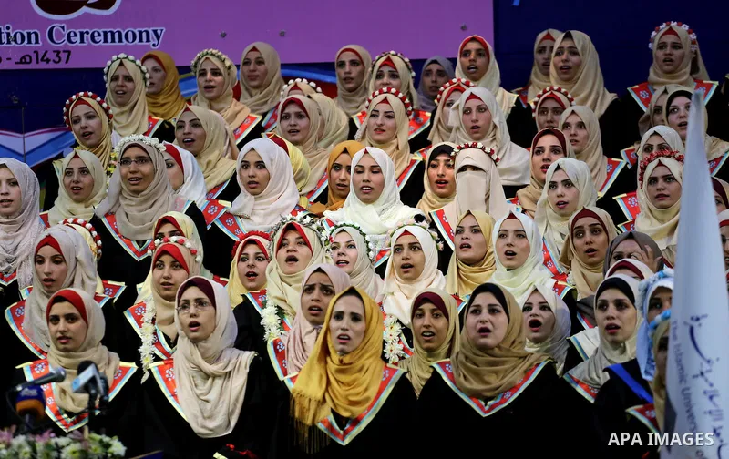 Palestinian students participate in their graduation ceremony at the Islamic University in Gaza city on July 23, 2016. Photo by Mohammed Asad