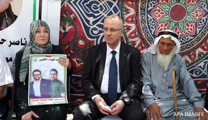 Palestinian Prime Minister, Rami Hamadallah, participates in the protest in solidarity with the prisoners on hunger strike in Manger Square, in the West Bank city of Bethleem, on July 24, 2016. Photo by Prime Minister Of...