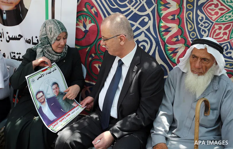 Palestinian Prime Minister, Rami Hamadallah, participates in the protest in solidarity with the prisoners on hunger strike in Manger Square, in the West Bank city of Bethleem, on July 24, 2016. Photo by Prime Minister Of...