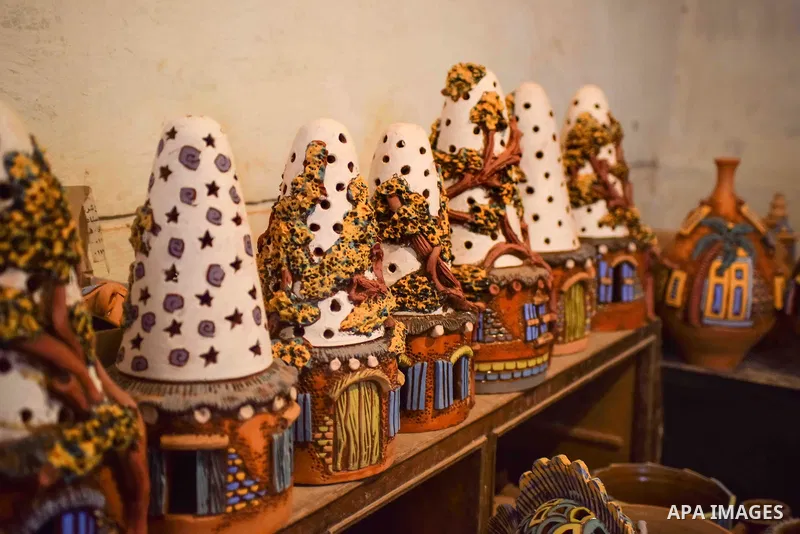 Pottery vessels are seen drying at a pottery workshop in Cairo, on July 24, 2016. Pottery is an ancient and traditional craft in Egypt. Local workshops usually produce products such as bowls, pitchers, flower pots, and v...