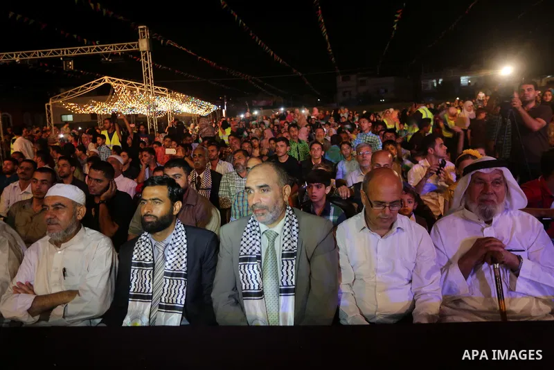 Palestinians take part in a mass wedding for 340 couples organized by Hamas movement in Beit Lahiya town in the northern Gaza Strip July 24, 2016. Photo by Mohammed Asad