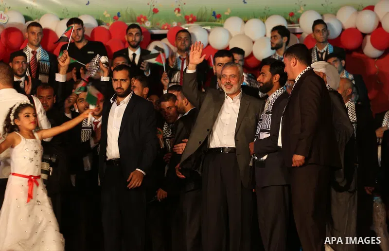 Senior Hamas leader Ismail Haniyeh attends a mass wedding for 340 couples organized by Hamas movement in Beit Lahiya town in the northern Gaza Strip July 24, 2016. Photo by Mohammed Asad