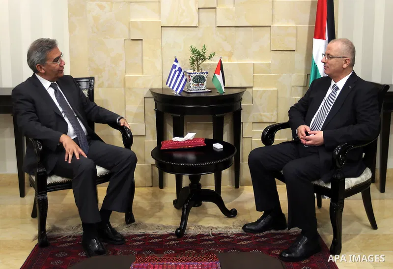 Palestinian Prime Minister Rami Hamdallah meets with Greek Consul General in Jerusalem Gerogios Zachariuksy, in the West Bank city of Ramallah on,July 25, 2016. Photo by Prime Minister Office