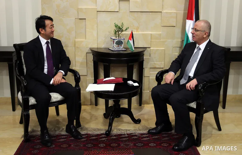 Palestinian Prime Minister Rami Hamdallah meets with Director General of the Middle East and Africa in the Japanese Foreign Ministry Katsuhiko Takahashi, in the West Bank city of Ramallah on,July 25, 2016. Photo by Prime...
