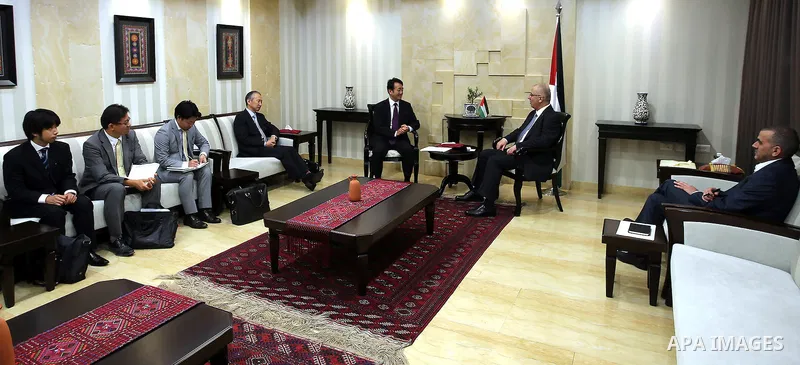 Palestinian Prime Minister Rami Hamdallah meets with Director General of the Middle East and Africa in the Japanese Foreign Ministry Katsuhiko Takahashi, in the West Bank city of Ramallah on,July 25, 2016. Photo by Prime...