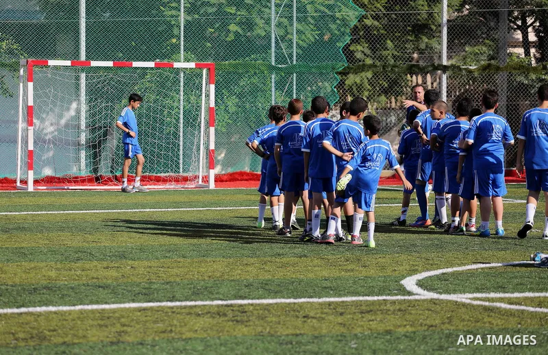 Palestinian boys take part in a training season for football school at Al Jazeera club in Gaza city, on July 26, 2016. Photo by Mohammed Asad