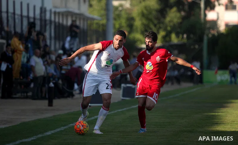 Palestinian Gaza Strip's Khan Younis Youth and Hebron's players compete during the first leg of the Palestine Cup final soccer match at al-Yarmouk stadium in Gaza City July 26, 2016. Photo by Ashraf Amra
