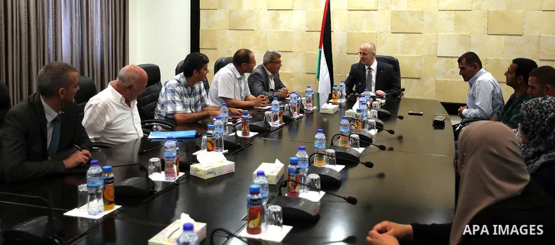 Palestinian Prime Minister Rami Hamdallah, meet with Palestinian families attackers, whose bodies are still under Israeli custody,, in the West Bank city of Ramallah, on July 28, 2016. Photo by Prime Minister Office