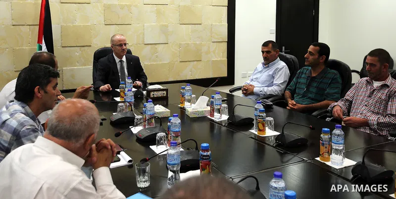 Palestinian Prime Minister Rami Hamdallah, meet with Palestinian families attackers, whose bodies are still under Israeli custody,, in the West Bank city of Ramallah, on July 28, 2016. Photo by Prime Minister Office