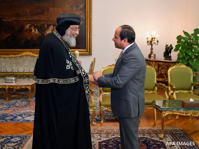 Egyptian President Abdel Fattah al-Sisi meets with Pope Tawadros II of Alexandria, in Cairo, Egypt, on July 28, 2016. Photo by Egyptian President Office