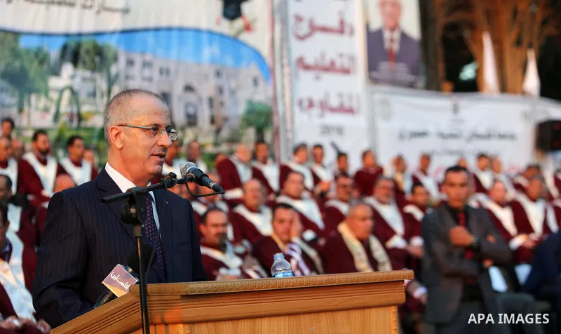 Palestinian Prime Minister Rami Hamdallah speaks during graduation ceremony at the Palestine Technical University - Kadoorie, in the West Bank city of Tulkarem, on July 28, 2016. Photo by Prime Minister Office
