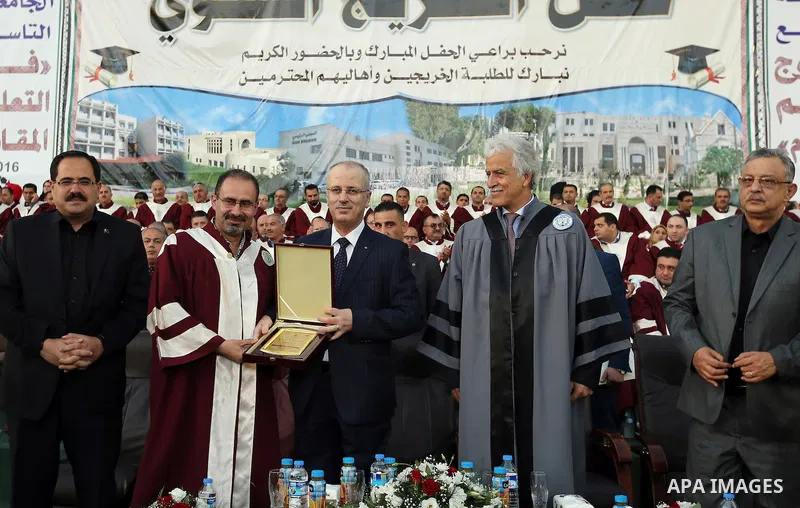 Palestinian Prime Minister Rami Hamdallah attends graduation ceremony at the Palestine Technical University - Kadoorie, in the West Bank city of Tulkarem, on July 28, 2016. Photo by Prime Minister Office