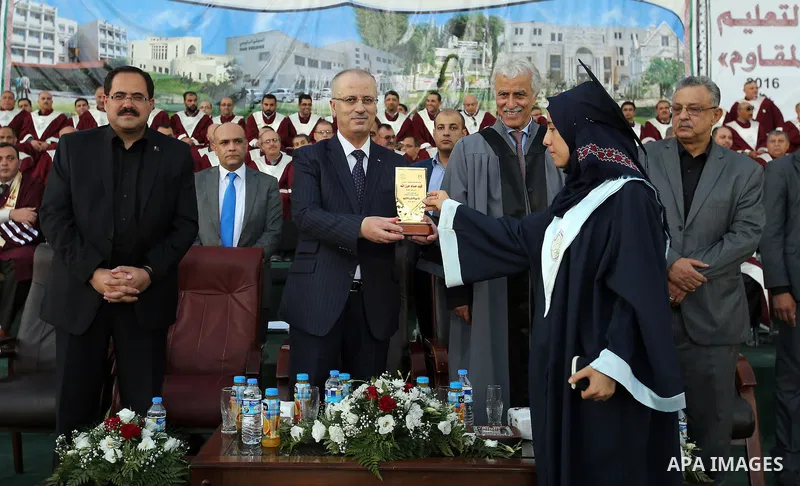 Palestinian Prime Minister Rami Hamdallah attends graduation ceremony at the Palestine Technical University - Kadoorie, in the West Bank city of Tulkarem, on July 28, 2016. Photo by Prime Minister Office