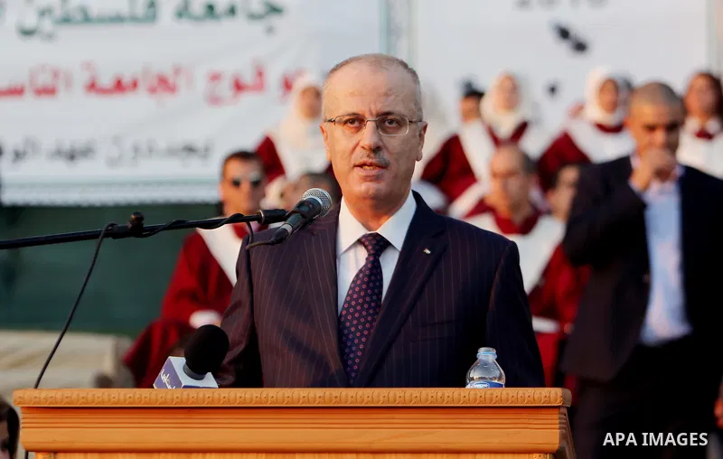 Palestinian Prime Minister Rami Hamdallah speaks during graduation ceremony at the Palestine Technical University - Kadoorie, in the West Bank city of Tulkarem, on July 28, 2016. Photo by Prime Minister Office