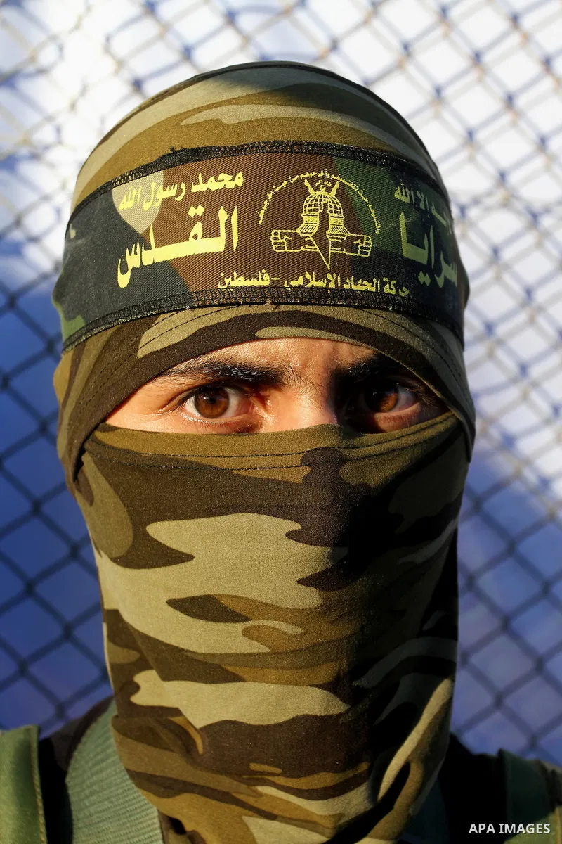 Palestinian militants from the Al-Quds Brigades, the armed wing of the Islamic Jihad movement, take part in a rally in Rafah in the southern Gaza Strip on July 28, 2016. Photo by Abed Rahim Khatib