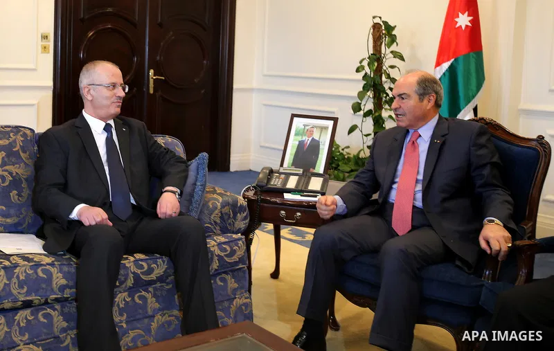 Palestinian Prime Minister Rami Hamdallah meets with Jordan's Prime Minister Hani Mulki, in Amman, Jordan, on July 30, 2016. Photo by Prime Minister Office