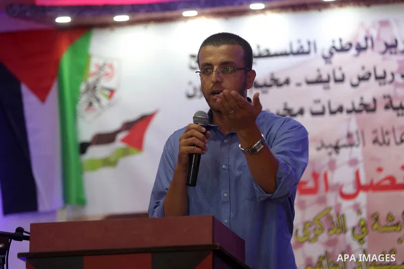 Palestinians attend a memorial service for Laith al-Khalidi who was killed by Israeli soldiers on August 1, 2015, during a demonstration after Jewish settlers attack Dawabsha family home, in Jalazoun refugee camp near th...