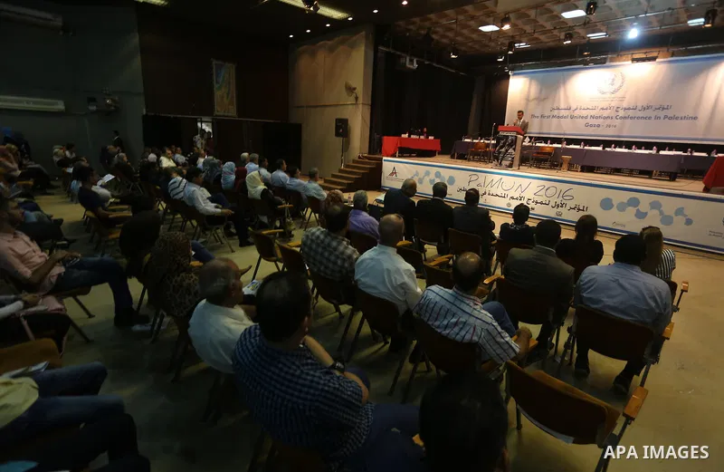 Palestinians take part in the first model of United Nations conference in Palestine, in Gaza city, on Aug. 2, 2016. Photo by Mohammed Asad