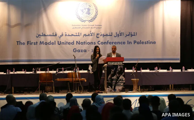 Palestinians take part in the first model of United Nations conference in Palestine, in Gaza city, on Aug. 2, 2016. Photo by Mohammed Asad