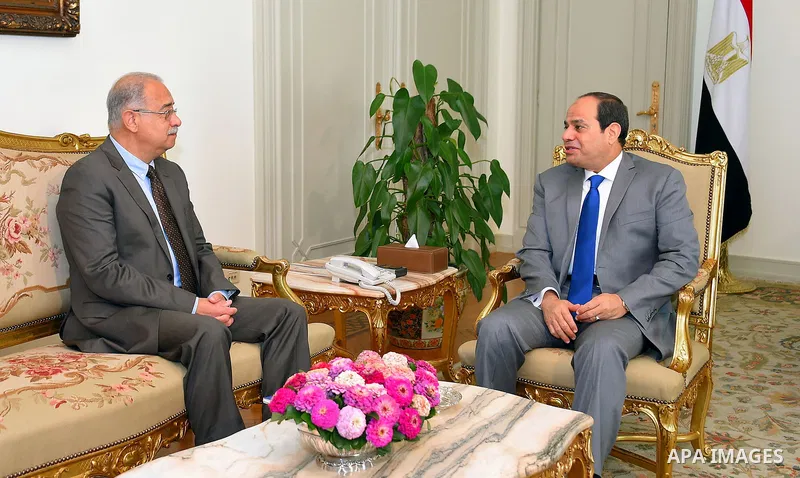 Egyptian President Abdel Fattah al-Sisi meets with Egyptian Prime Minister Sharif Ismail in Cairo, Egypt, on Aug. 02, 2016. Photo by Egyptian President Office