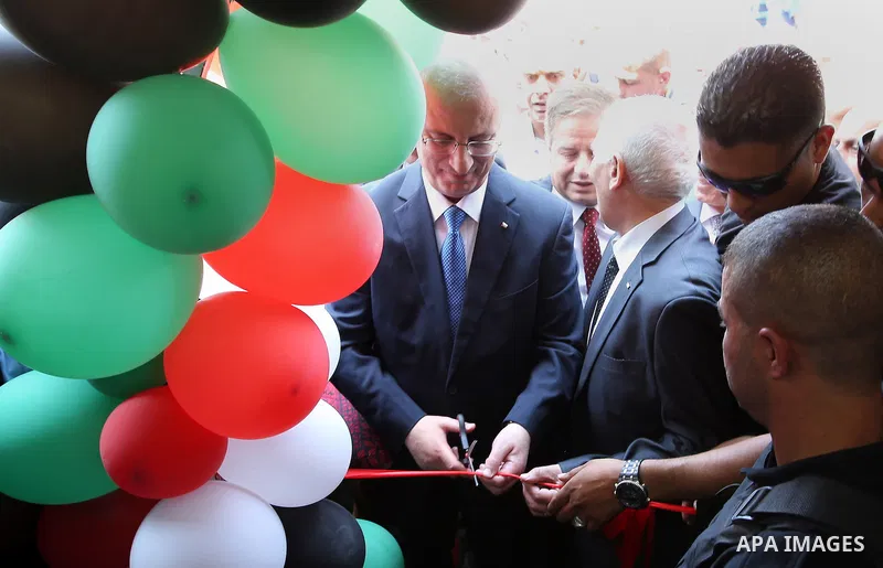 Palestinian Prime Minister Rami Hamdallah attends the opening ceremony of the new wing operations of Alia governmental hospital, in the West Bank city of Hebron, on Aug. 03, 2016. Photo by Prime Minister Office