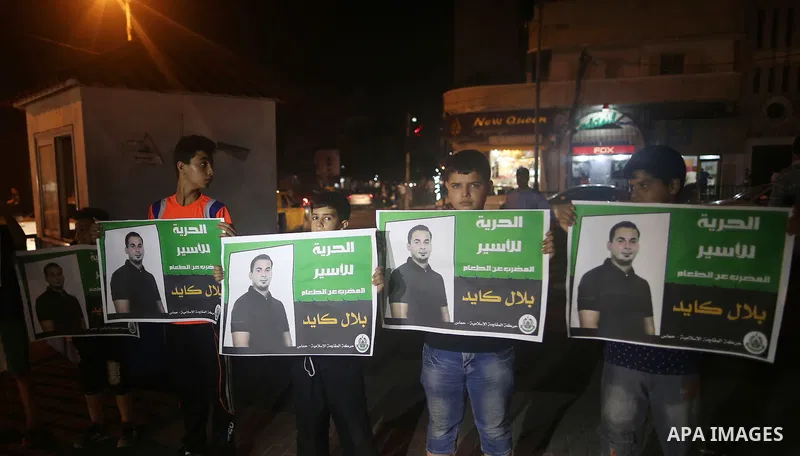 Palestinian children take part in a protest demanding for the release of Bilal Kayed a Palestinian prisoner on hunger strike, in Gaza city, on Aug. 03, 2016. Kayed who was due to be released after serving a 14-and-a-half...