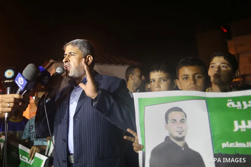 Palestinian children take part in a protest demanding for the release of Bilal Kayed a Palestinian prisoner on hunger strike, in Gaza city, on Aug. 03, 2016. Kayed who was due to be released after serving a 14-and-a-half...