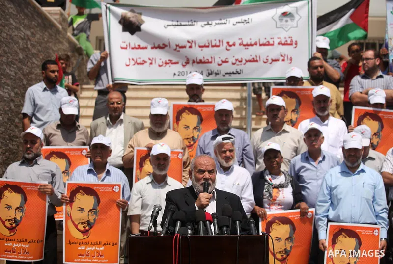 Deputy Speaker of the Legislative Council, Ahmed Bahar, speaks during a protest demanding for the release of Palestinian prisoners on hunger strike in Israeli jails, in Gaza city, on Aug. 04, 2016. Photo by Ashraf Amra