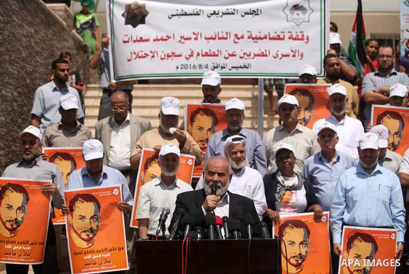 Deputy Speaker of the Legislative Council, Ahmed Bahar, speaks during a protest demanding for the release of Palestinian prisoners on hunger strike in Israeli jails, in Gaza city, on Aug. 04, 2016. Photo by Ashraf Amra