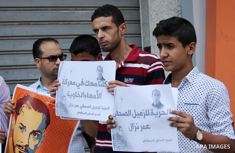 Palestinian journalists take part during a protest calling for the release of Palestinian journalist Omar Nazal who is on hunger strike in Gaza city on Aug. 04, 2016. Photo by Mohammed Asad