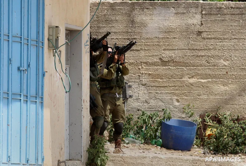Israeli security forces fired a tear gas canister during clashes with Palestinian protesters following the weekly demonstration against the expropriation of Palestinian land by Israel in the village of Kfar Qaddum, near...
