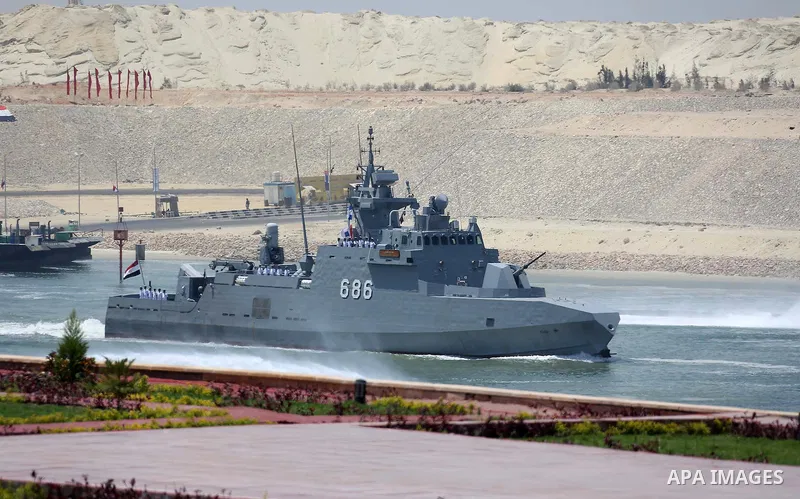 The Mistral-class helicopter carrier Gamal Abdel Nasser (ex-Vladivostok) crosses the new section of the Suez Canal during the first anniversary of launching the New Suez Canal and the 60th anniversary of nationalizing th...