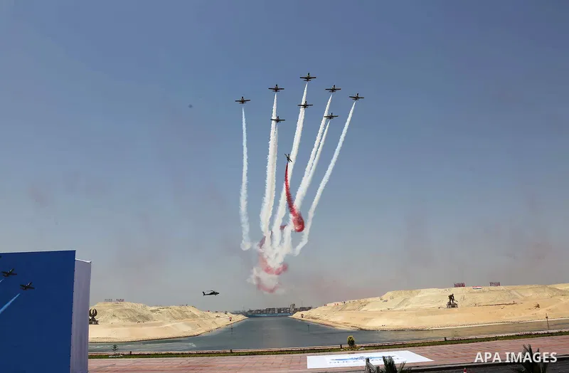 Egyptian air force planes fly overhead during the first anniversary of launching the New Suez Canal and the 60th anniversary of nationalizing the Suez Canal in Ismailia, Egypt August 6, 2016. Photo by Egyptian President...
