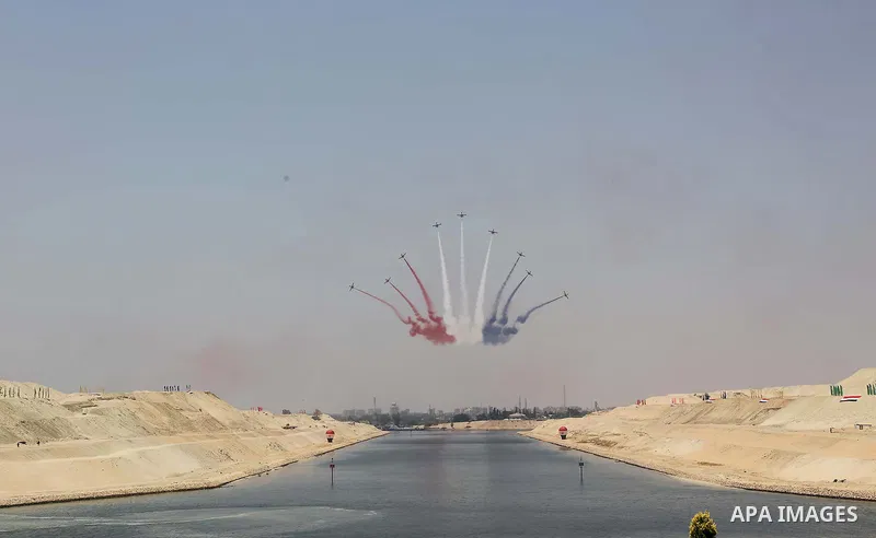 Egyptian air force planes fly overhead during the first anniversary of launching the New Suez Canal and the 60th anniversary of nationalizing the Suez Canal in Ismailia, Egypt August 6, 2016. Photo by Egyptian President...